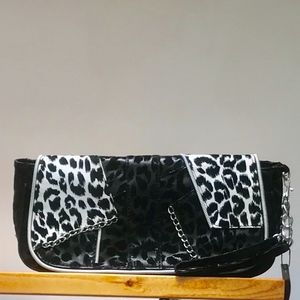 Flocked leopard wristlet clutch